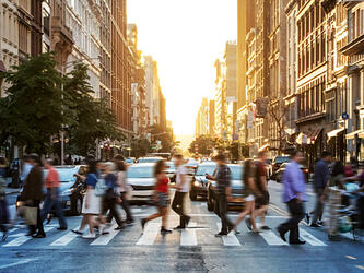 people crossing the street in new york city